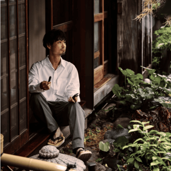 米原康人